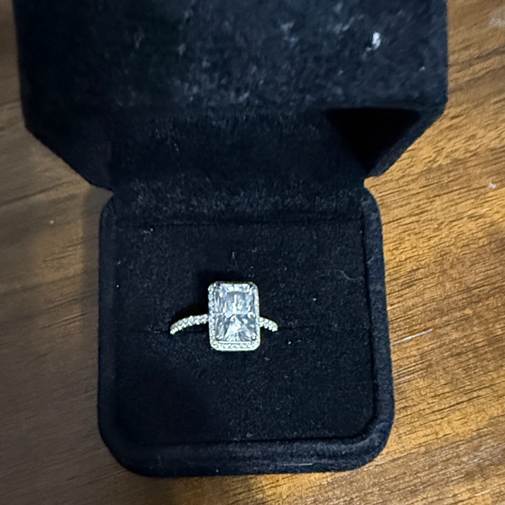 Elegant Silver Ring with Moissanite Center Stone
